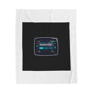 May include: A black square blanket featuring a digital display graphic with a "System Error" message. The display has blue, green, and pink accents, with "OK", "Cancel", and "Retry" buttons. The blanket is framed by a white border.