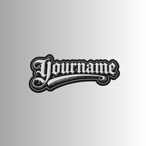 May include: A black and white embroidered patch featuring the word Yourname written in a stylised gothic font. The design includes a prominent swooping underline that extends from the letter Y and curves beneath the text, creating a bold emblem.