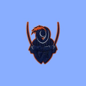 May include: An embroidered patch featuring a stylized dark blue figure with a prominent orange crest and two long, curved orange accents extending upward. The design includes white outlines and a central circular element, all bordered by a thick orange edge.
