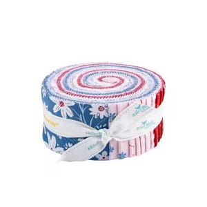 May include: A fabric jelly roll featuring a spiral of tightly wound cotton strips in shades of blue, white, pink, and red. The fabric displays floral patterns and geometric designs, secured by a white ribbon printed with the Riley Blake Designs logo.