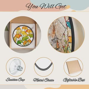 May include: A circular stained glass suncatcher featuring yellow and green ginkgo leaves, a clear suction cup, a black metal chain, and a brown cardboard box. The text "You Will Get", "Suction Cup", "Metal Chain", and "Giftable Box" is visible.