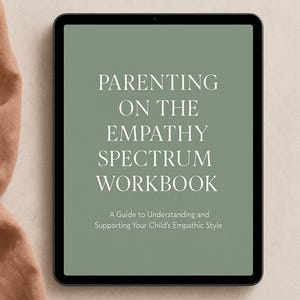 Könnte beinhalten: Ein digitales Tablet zeigt den Text "PARENTING ON THE EMPATHY SPECTRUM WORKBOOK" in Weiß auf einem salbeigrünen Hintergrund. Darunter steht "A Guide to Understanding and Supporting Your Child's Empathic Style."