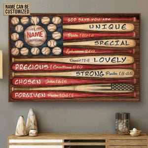 May include: A wooden sign featuring a baseball-themed American flag design. The flag's stripes are represented by baseball bats, and the stars are replaced with baseballs. Text includes "GOD SAYS YOU ARE UNIQUE, SPECIAL, LOVELY, STRONG, CHOSEN, FORGIVEN."