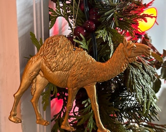Adorno de camello dorado (1 pieza)