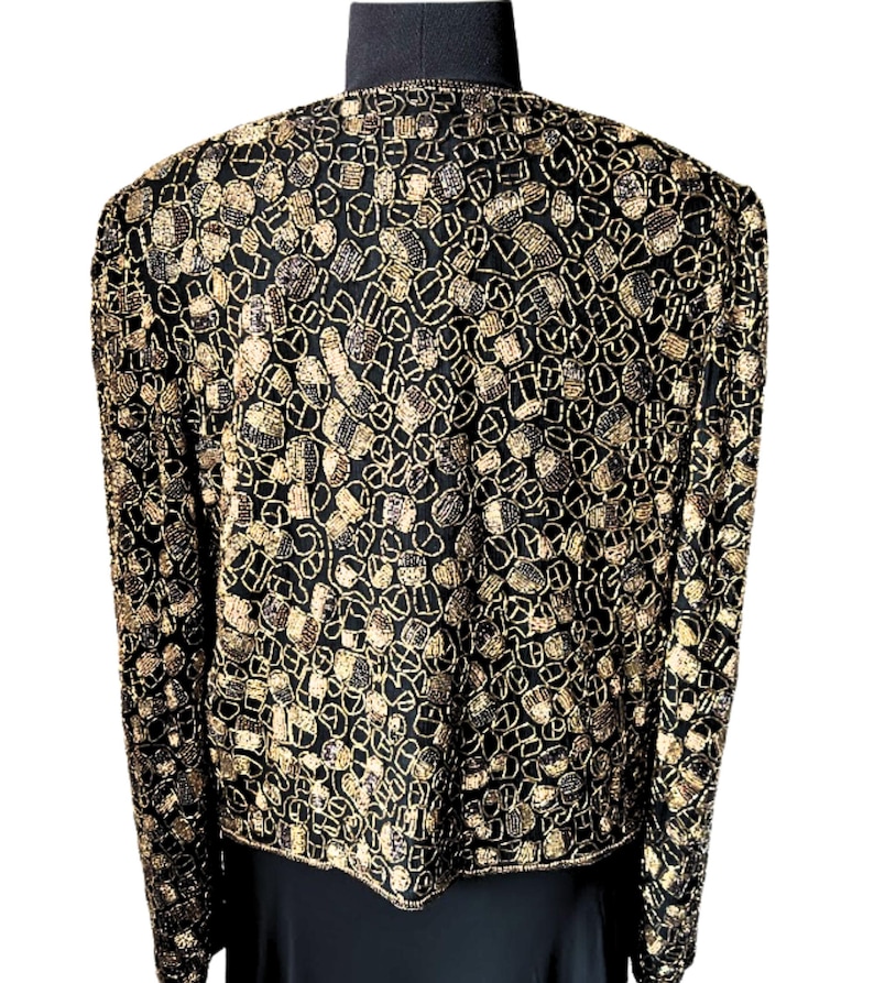 Designer Adrianna Papell beaded silk jacket back view.