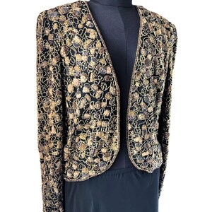 Designer Adrianna Papell beaded silk jacket front view.