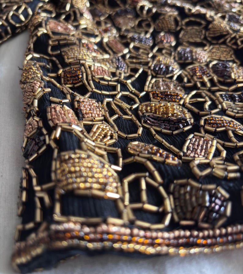 Hand-beaded Adrianna Papell silk bolero with metallic finish detail