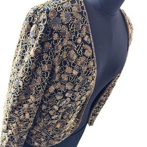 Glamorous gold and black mosaic beaded topper for women.