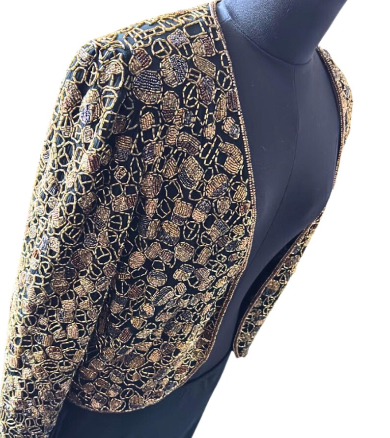 Glamorous gold and black mosaic beaded topper for women.