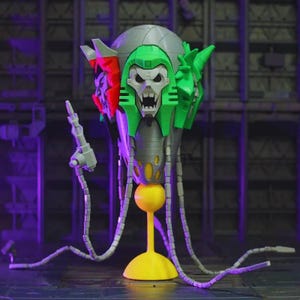 Peut inclure: Figurine d'action détaillée d'un extraterrestre robotique avec un visage en forme de crâne. La figurine a une tête argentée, des accents verts et rouges et une base jaune. Elle comprend une arme et plusieurs appendices en forme de tentacules.
