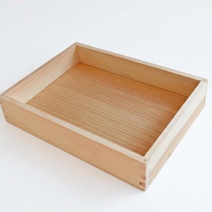 May include: A rectangular wooden box with a light brown finish. The box has a simple design with visible wood grain on the interior base and sides. The box is empty and sits on a white surface.