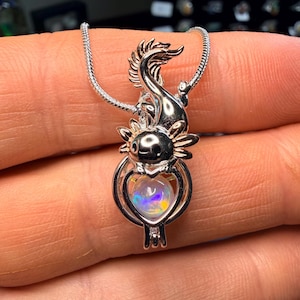 Axolotl pendant containing a 1 carat Ethiopian opal sphere and sterling silver snake chain