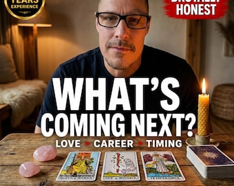 May include: A man with glasses is centered in the image, with the text "WHAT'S COMING NEXT?" in large white letters. Below, tarot cards and rose quartz crystals are on a wooden table. The image includes the text "LOVE CAREER TIMING" and "SAME DAY REAL ANSWERS".