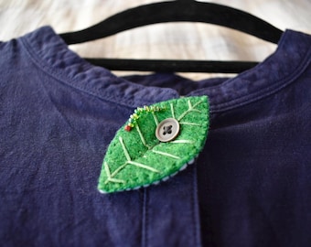 Badge met lommerrijke knopen