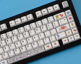 Juego de teclas inspirado en Keith Haring / Estilo pop art vibrante / 139 teclas con perfil PBT Cherry / Líneas atrevidas e iconos coloridos