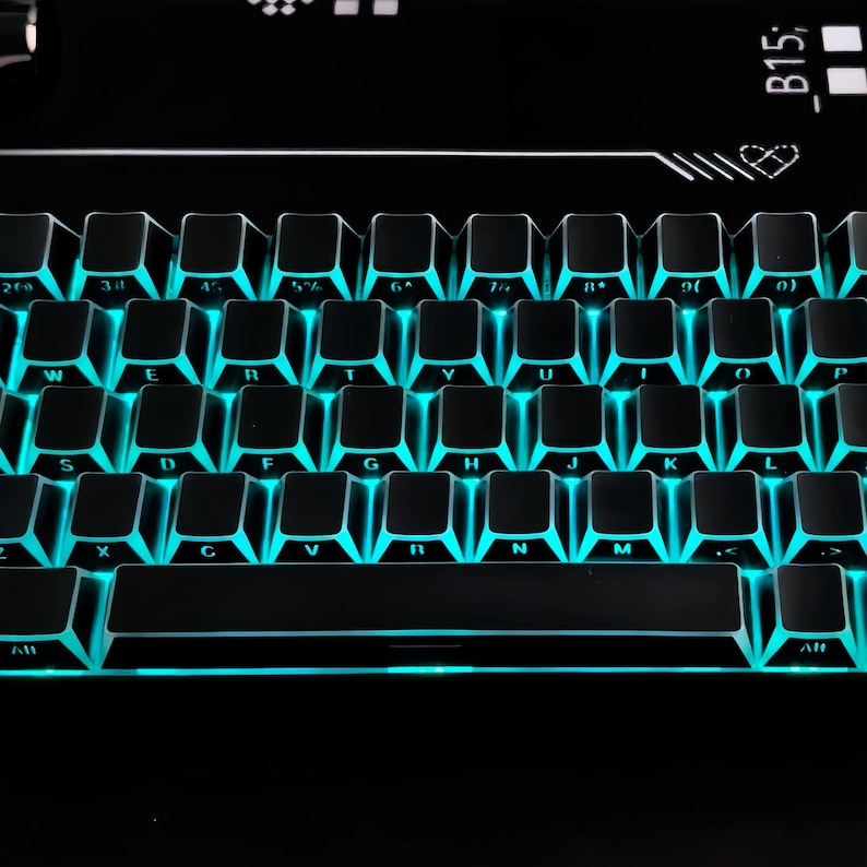 May include: A black mechanical keyboard with teal illuminated keys. The keyboard has a standard QWERTY layout with function keys and a space bar. The keys are backlit, creating a vibrant glow. The keyboard is designed for gaming or typing.