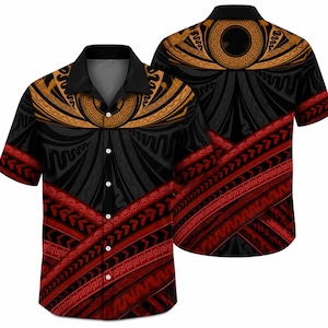 May include: A short-sleeved button-down shirt featuring a black base with intricate gold and red geometric patterns. The design includes a prominent gold circular motif around the collar and bold red diagonal bands with Greek key accents.