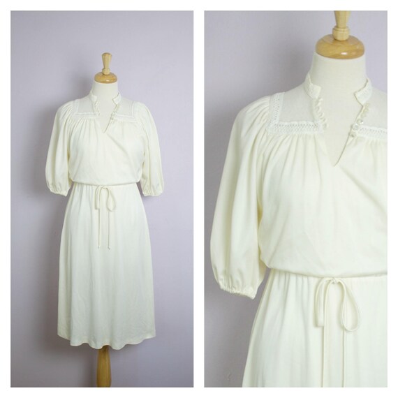 cream midi dress with sleeves