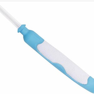 May include: An ear cleaning tool with a long, white, flexible tip. The handle is light blue with a white, textured grip. The tool is designed for ear hygiene.