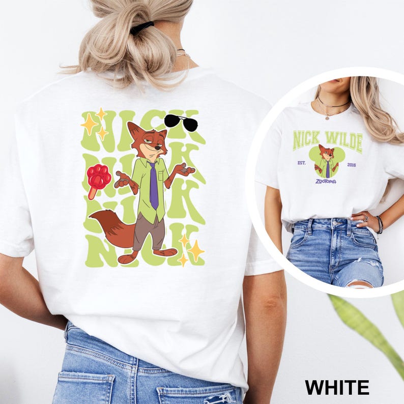 May include: White t-shirt featuring a cartoon fox character with sunglasses, a green shirt, and a purple tie. The design includes the name "Nick" in green stylized letters and a lollipop. A smaller image of the character is on the front.