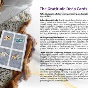 May include: A deck of 'The Gratitude Deep Cards' with four illustrated cards. The cards, featuring colourful designs, are displayed on a neutral surface. Text describes the deck's purpose: reflective gratitude for healing and emotional integration.