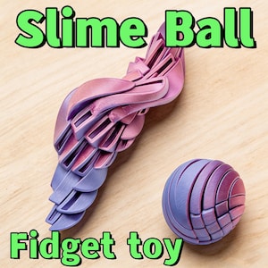 May include: A two-piece fidget toy set. One piece is a wing-shaped design, and the other is a ball. Both are in shades of purple and pink. The words "Slime Ball" and "Fidget toy" are in green.