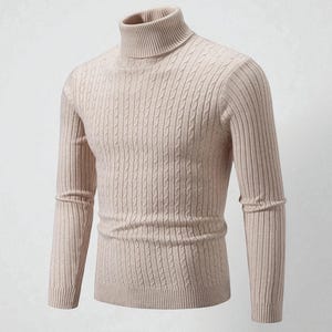 May include: A beige turtleneck sweater with a cable knit design. The long-sleeved sweater has a ribbed collar and cuffs. The neutral color and classic design make it a versatile wardrobe staple.
