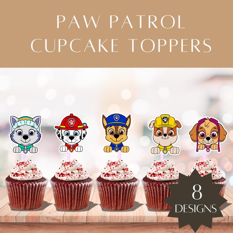 May include: Cupcakes with red velvet cake and white frosting, topped with red sprinkles. Each cupcake has a Paw Patrol character topper. The image includes the text "PAW PATROL CUPCAKE TOPPERS" and "8 DESIGNS".
