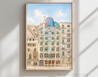 May include: Watercolor painting of a building with a colorful mosaic facade, arched windows, and a multi-colored tiled roof. The artwork is framed in a light wood frame and set against a light blue sky with clouds. The text "NEUVIA CREATIVE" is at the bottom.