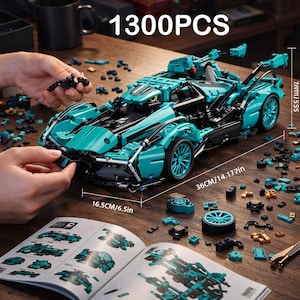 May include: A teal and black model sports car made of 1300 pieces, with dimensions of 14.117 inches long and 6.5 inches wide. The image shows the car being assembled, with a manual and loose pieces scattered around.