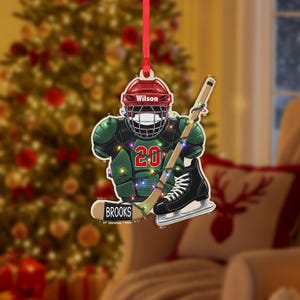 Enfeite personalizado para jogador de hóquei: decoração para árvore esportiva com nome personalizado e uniforme para pendurar