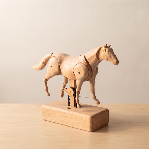 A rechargeable motorized wooden horse automaton with a galloping gait — the mechanical engineering here is genuinely jaw-dropping at this price point.