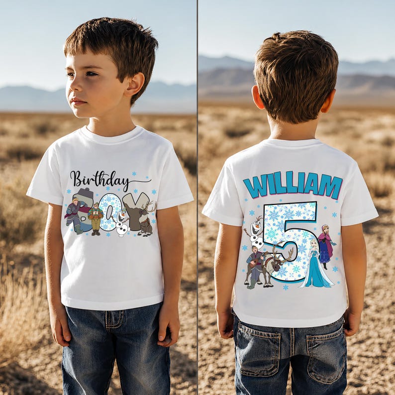 May include: White t-shirt with a colorful graphic featuring characters and the text "Birthday Boy" on the front. The back of the shirt displays the name "William" and the number "5" with additional character illustrations.