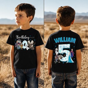 May include: Black t-shirt with a "Birthday Boy" graphic featuring characters from a popular animated movie. The number "5" is on the back, along with the name "William". The shirt is worn by a young boy in blue jeans.