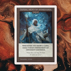 May include: A rectangular trading card titled Teferi, Hero of Dominaria Emblem. The card features an illustration of a figure in white robes holding a staff amidst blue magical energy. The text reads: Whenever you draw a card, exile target permanent an opponent controls. Time does not stop for him. It waits its turn.
