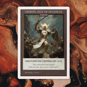 May include: A rectangular trading card titled Gideon, Ally of Zendikar Emblem. The card features an illustration of a warrior in golden armor holding a sword aloft. Text reads: Creatures you control get +1/+1. His command was simple: hold the line.