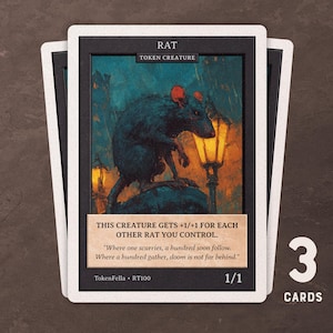May include: Three trading cards featuring a dark illustration of a rat with red ears, set against a backdrop of a lamplit street. The cards have a black border and white edges, with text that reads "RAT" and "TOKEN CREATURE". The cards are labeled "1/1".
