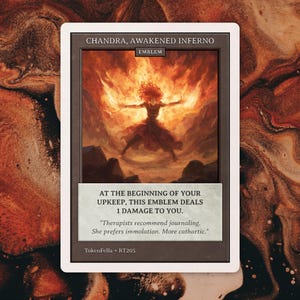 May include: A card featuring the artwork of Chandra, Awakened Inferno. The image shows a figure with fiery hair and outstretched arms, surrounded by flames. Text includes "EMBLEM" and a quote about journaling and immolation.