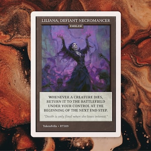May include: A rectangular trading card titled Liliana, Defiant Necromancer, featuring an illustration of a figure in a black dress with chains, surrounded by purple mist. The text reads: Whenever a creature dies, return it to the battlefield.