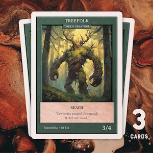 May include: A rectangular game card featuring a Treefolk token creature illustration in a forest setting. The card has a green border, white text boxes, and the word REACH printed above flavor text. The bottom right corner displays 3/4.