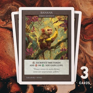 May include: Three trading cards featuring a monkey holding a banana in a jungle setting. The cards have a white border and the word "BANANA" at the top. Text on the card reads "SACRIFICE THIS TOKEN: ADD R OR G. YOU GAIN 2 LIFE."