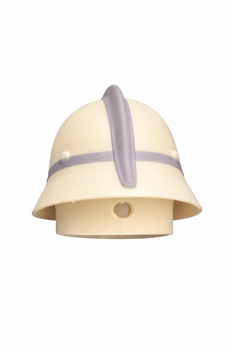 May include: A cream-colored pith helmet with a gray band and a vertical gray stripe. The helmet has a circular hole at the bottom. This safari-style hat is a classic accessory.
