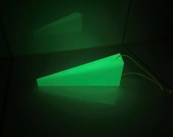 Glow-in-the-dark 3D door wedge, fire department/police design, with retaining strap
