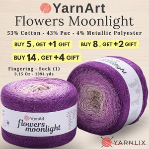 May include: Two cakes of YarnArt Flowers Moonlight yarn featuring a purple to light pink gradient with metallic flecks. The label states 53% Cotton, 43% Pac, 4% Metallic Polyester, 9.15 Oz, and 1094 yds. Text includes Buy 5, get +1 gift, Buy 8, get +2 gift, Buy 14, get +4 gift.