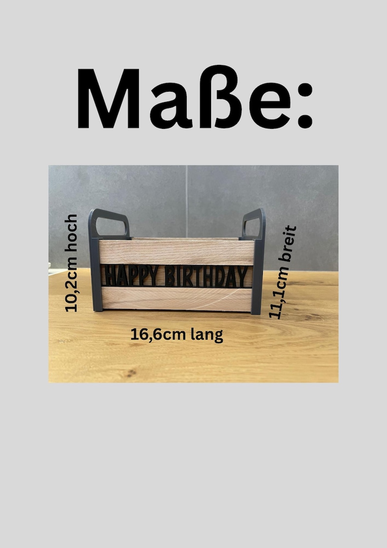 May include: A wooden box with the words "HAPPY BIRTHDAY" cut out. The box is 16.6 cm long, 10.2 cm high, and 11.1 cm wide. It has black handles on each end.