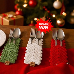May include: Three crochet Christmas tree-shaped utensil holders in green, white, and red, each holding a fork and spoon. The holders sit on a red tablecloth, with a Christmas tree and gift box in the background. The text "DOWNLOAD NOW" is in a red starburst.