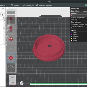 May include: A digital 3D printer slicing software interface displaying a circular red object on a grid build plate. The screen shows project filaments, plate settings, and a slicing result window with time estimation and filament usage data.