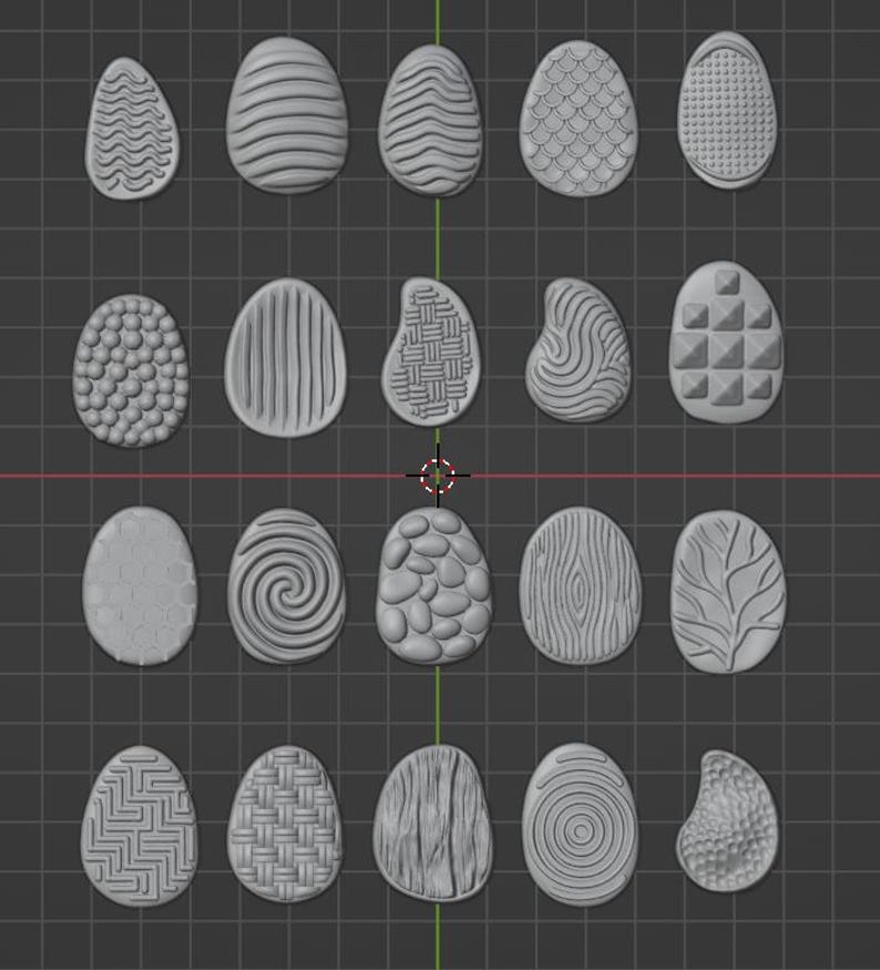 May include: A collection of 18 gray, egg-shaped objects with various surface textures. Designs include wavy lines, scales, pebbles, wood grain, and geometric patterns. The objects are arranged on a dark gray grid.