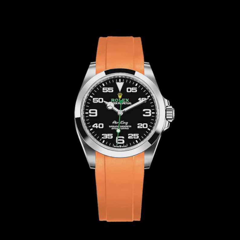 May include: A stainless steel Rolex Air King watch with a black dial and orange rubber strap. The watch face features white numerals and hands, with the Rolex logo at the top. The watch is set against a black background.