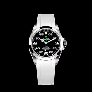 May include: A silver Rolex Air King watch with a black dial and white band. The watch face displays the Rolex logo, the words "Air King", and the time. The watch has a white band.